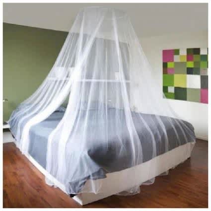 Mosquito Nets Over Bed